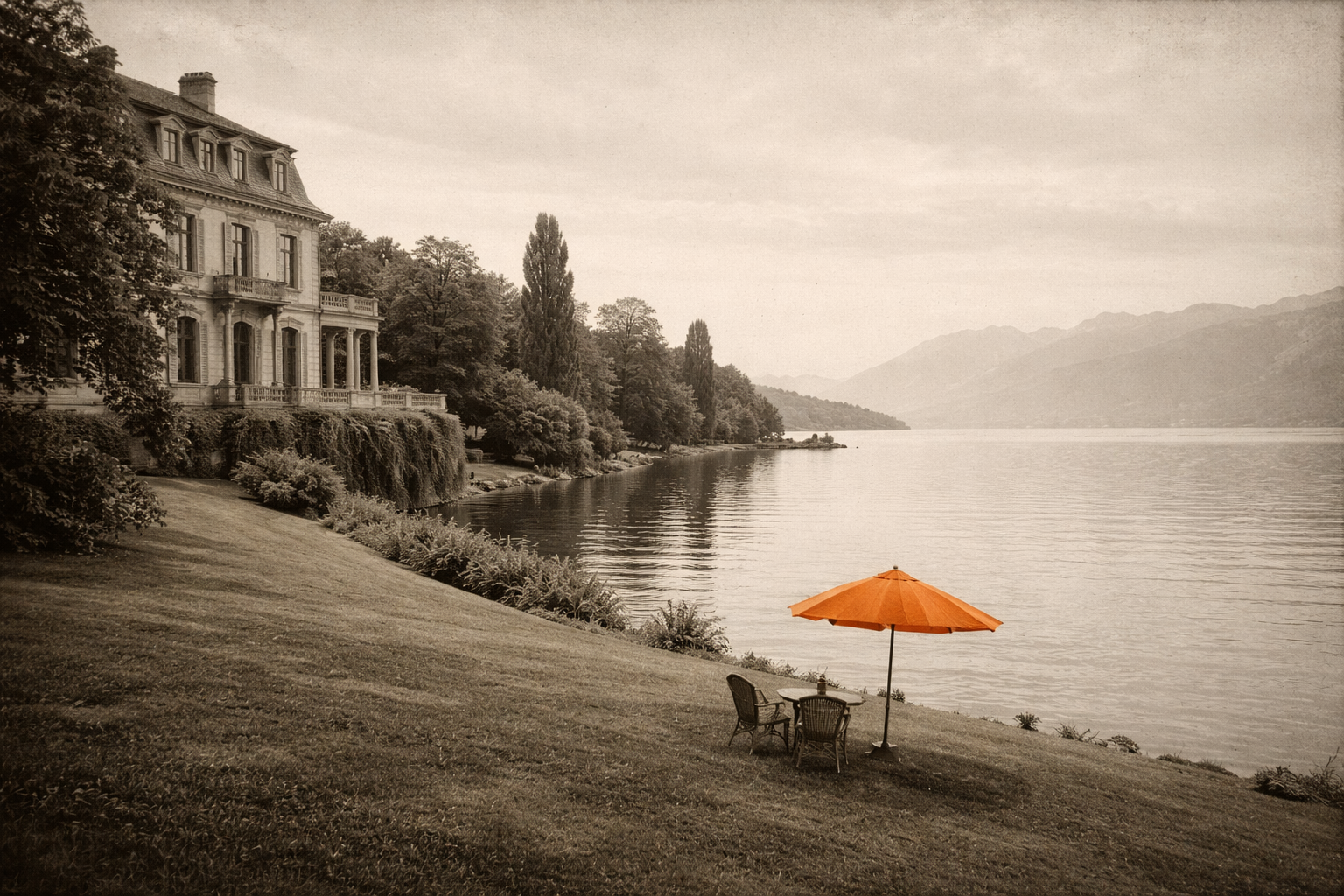 A faded archival-style image of a grand lakeside villa with an orange umbrella on the lawn.